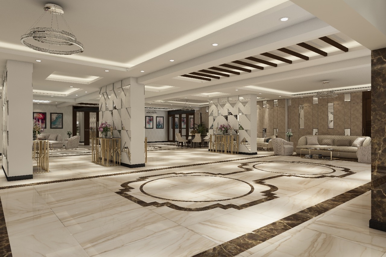 Grand lobby with marble inlay floor, mirrored columns and gold balustrades