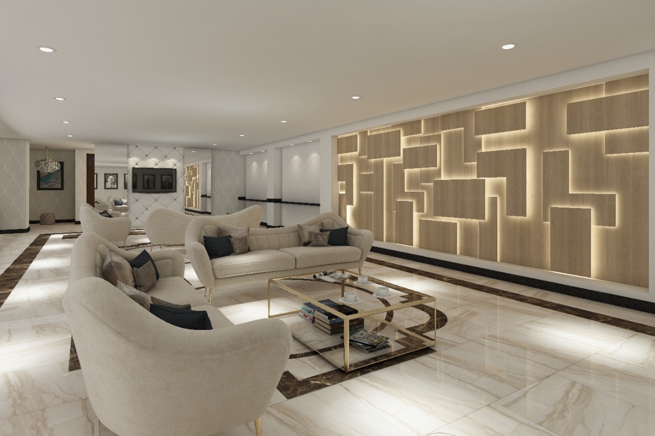 Lounge with a backlit wood feature wall and cream sofas